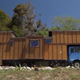 Illustration for article titled New Zealand Couple Turns Dingy Cargo Truck Into A Quaint Country Home